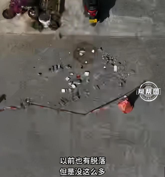 回家步步惊心！小区外墙鼓包脱落砸坏两辆车还差点砸到人